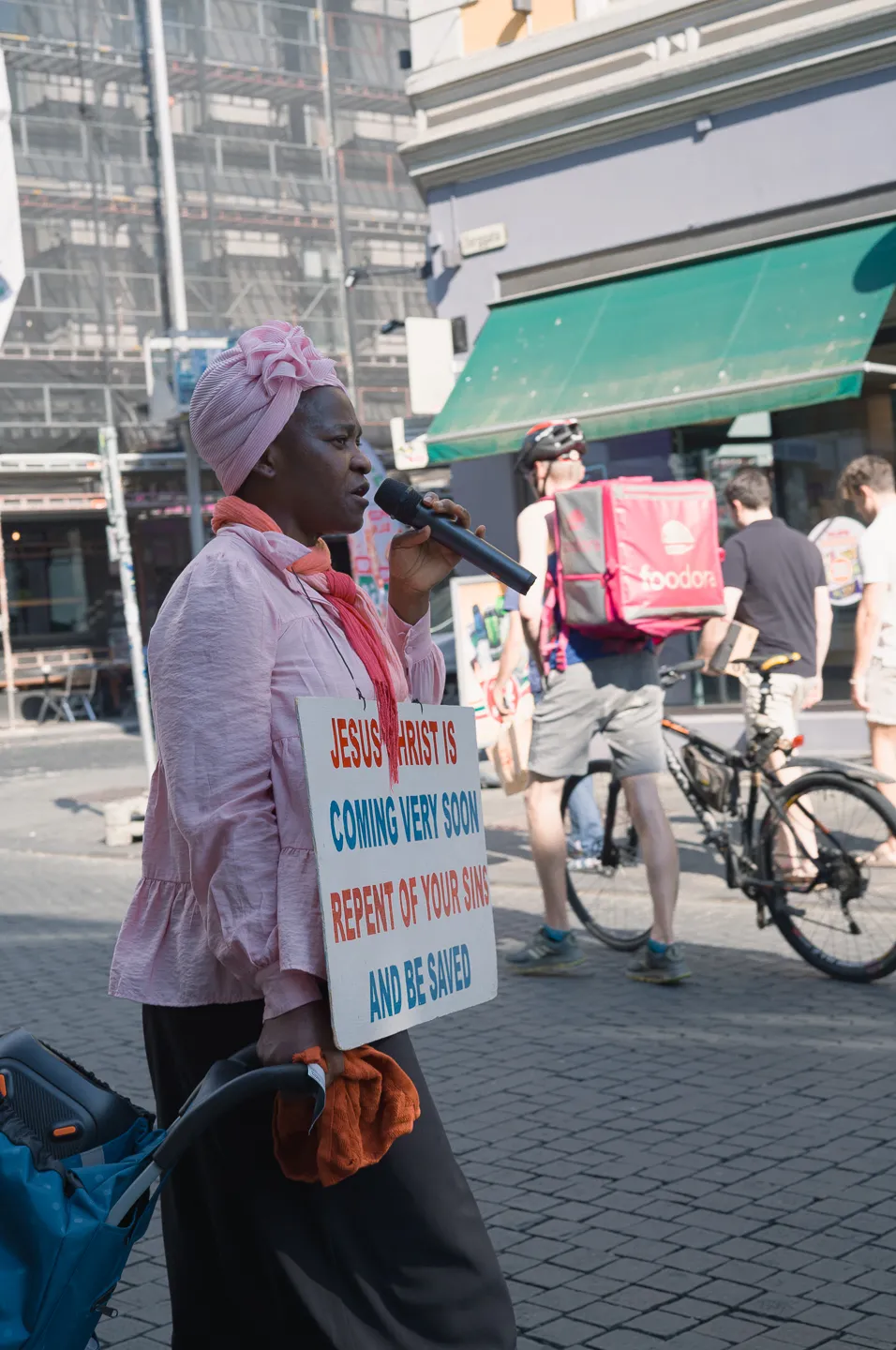 Portrait in the city with layered reflections