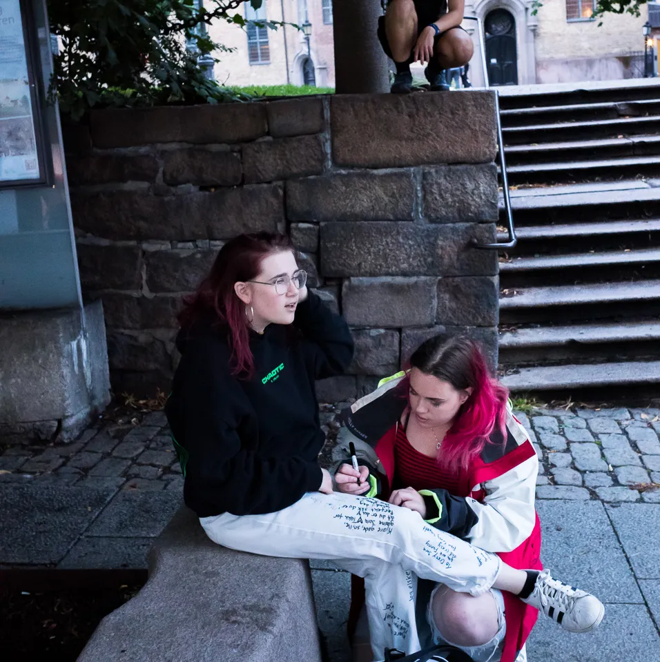 Portrait detail with handwritten text on trousers