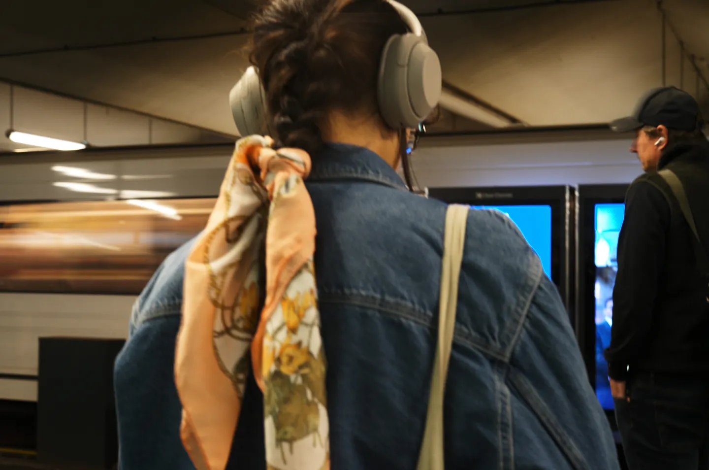 Woman with a scarf wrapped around her hair